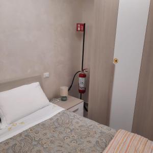 A bed or beds in a room at Chez Lulù