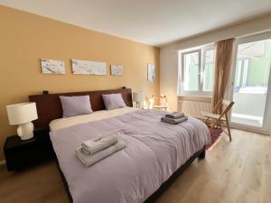 UP&GREAT Apartments - Stylish City Living客房内的一张或多张床位