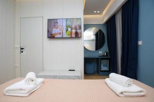 Postel nebo postele na pokoji v ubytování Imperial Visar Rooms + 37 fotografií