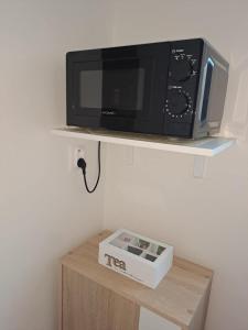 TV a/nebo společenská místnost v ubytování Apartmán Apaya