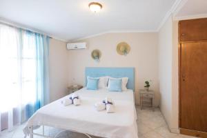 Postel nebo postele na pokoji v ubytování Casa Dei Venti Sea View Appartments