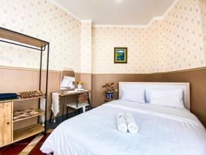 Ένα ή περισσότερα κρεβάτια σε δωμάτιο στο Pavilion The Lodge