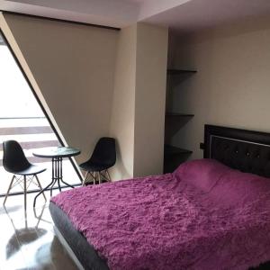 Ένα ή περισσότερα κρεβάτια σε δωμάτιο στο Marshall compelx