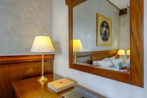 Ліжко або ліжка в номері EONA BEACH RESORT by Greek Pride