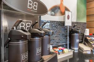 a row of kettles on a counter in a store at Fairfield Inn & Suites Sioux Falls in Sioux Falls