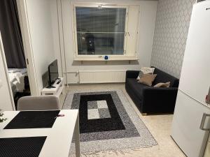 Predel za sedenje v nastanitvi Aarni - SimpleStudio in Tornio