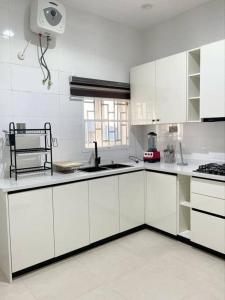Kuchyň nebo kuchyňský kout v ubytování Dasah Apartment