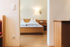 Hotel Schneider Dependance客房内的一张或多张床位