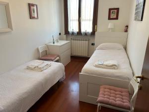 Postel nebo postele na pokoji v ubytování Todeschini 27