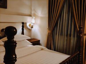 Posteľ alebo postele v izbe v ubytovaní Union Square Hotel