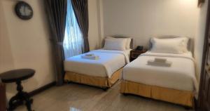 Posteľ alebo postele v izbe v ubytovaní Union Square Hotel