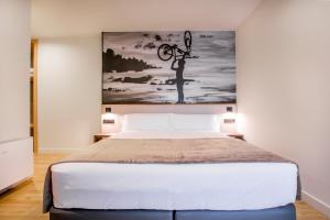 Voodi või voodid majutusasutuse Hotel Llivia toas