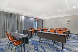 a conference room with tables and chairs and a pool table at Fairfield Inn & Suites by Marriott Houston NASA/Webster in Webster +22 photos