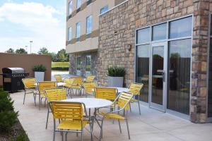 a group of tables and chairs on a patio at Fairfield Inn & Suites by Marriott Omaha Papillion in Papillion