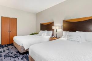 Postel nebo postele na pokoji v ubytování Fairfield Inn & Suites by Marriott Houston Conroe