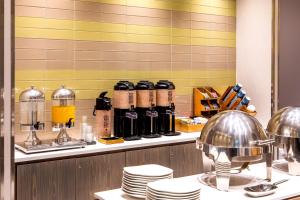 Příslušenství pro přípravu čaje a kávy v ubytování Four Points by Sheraton Midtown - Times Square