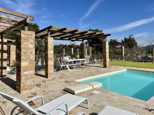 Πισίνα στο ή κοντά στο Eutopia Sani Villas with private pool