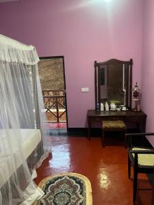 Postel nebo postele na pokoji v ubytování Dili's Homestay + 39 fotografií