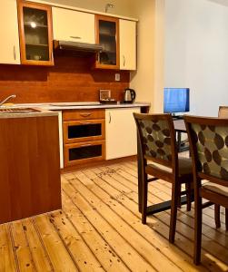 Kuchnia lub aneks kuchenny w obiekcie Apartamenty i Studia HERBARIUM