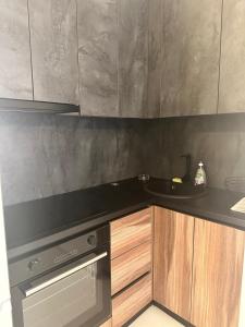 Kuchyň nebo kuchyňský kout v ubytování Glamorous One