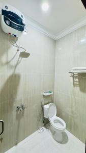 Baðherbergi á Camelia Guesthouse Syariah