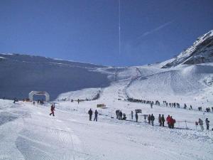 a group of people standing on a snow covered mountain at Haus Stefan in Längenfeld