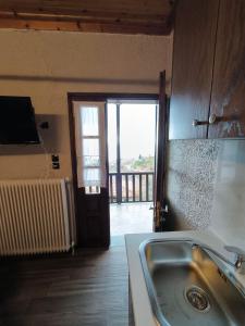 Fotografie z fotogalerie ubytování Enastron Guesthouse v destinaci Palaios Panteleimon