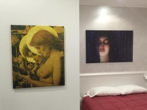 Postel nebo postele na pokoji v ubytování Picaflor Art & Rooms