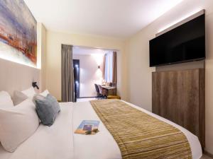 Телевизор и/или развлекательный центр в Mercure Oostende