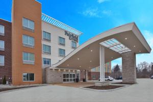 a hospital building with a large building with a building at Fairfield Inn & Suites by Marriott Flint Grand Blanc in Grand Blanc