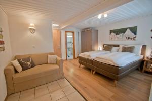 Postel nebo postele na pokoji v ubytování Chalet Aeschhorn