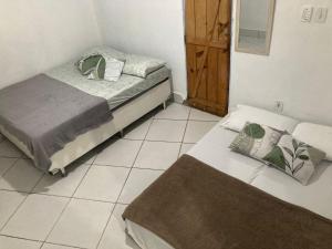 Postel nebo postele na pokoji v ubytování Hostel Rota 027 Itacaré