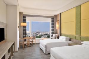 Ліжко або ліжка в номері Four Points By Sheraton Penghu