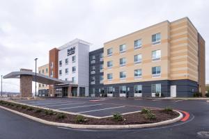 a parking lot in front of a hotel at Fairfield Inn & Suites by Marriott Staunton in Staunton