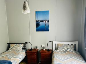 The Lazy Frog Cottage客房内的一张或多张床位