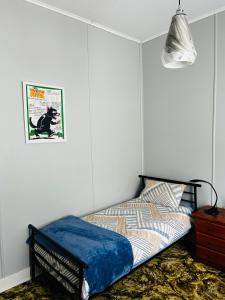 The Lazy Frog Cottage客房内的一张或多张床位