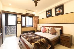 Postel nebo postele na pokoji v ubytování House Of Comfort Delhi