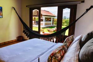 En eller flere senge i et værelse på Chalet Privado