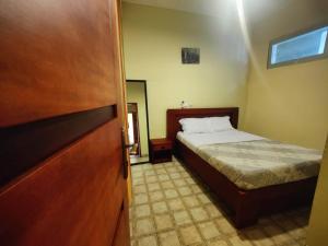 Ένα ή περισσότερα κρεβάτια σε δωμάτιο στο TDD a4