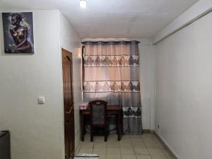 Posezení v ubytování Tadagbe Appart Studio1