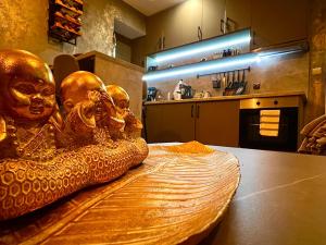 a group of heads sitting on a table in a kitchen at CozyHomes in Bansko