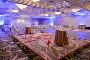a banquet hall with a table set up for a party at Delta Hotels by Marriott Regina in Regina +64 photos