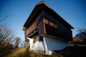 a house on top of a hill at chalet haute-savoie in Thollon