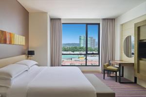 Ένα ή περισσότερα κρεβάτια σε δωμάτιο στο Four Points by Sheraton Puchong