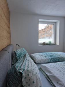 Postel nebo postele na pokoji v ubytování HAGGNER Hideaway
