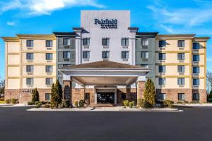 a rendering of a hotel with a parking lot at Fairfield by Marriott Inn & Suites Greensboro Coliseum Area in Greensboro