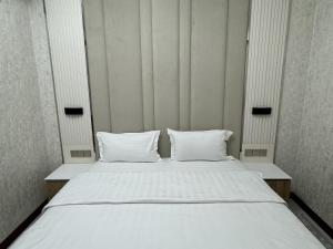 Aram Hotel客房内的一张或多张床位