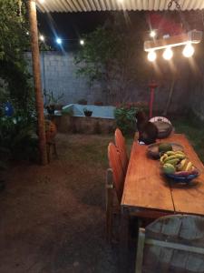 Κήπος έξω από το Casa confortável - 15min da praia