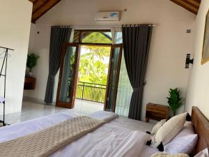 Dira Bungalows客房内的一张或多张床位