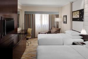 Postel nebo postele na pokoji v ubytování Four Points By Sheraton Riyadh Khaldia